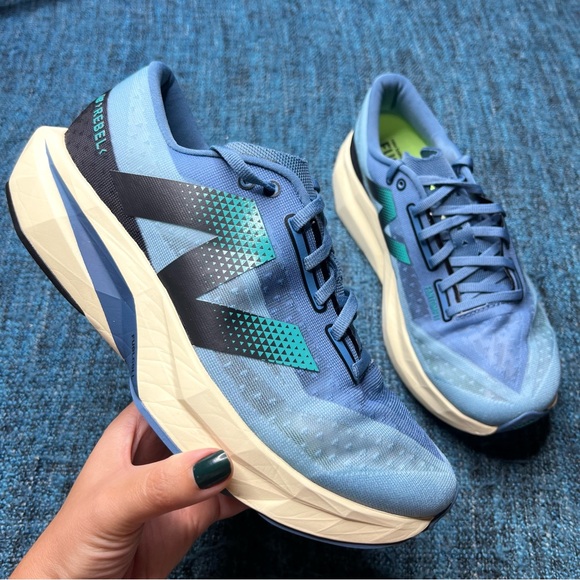 New Balance FuelCell Rebel V4 Running Shoes in Heron Blue Chrome Blue Black WIDE - Picture 1 of 9